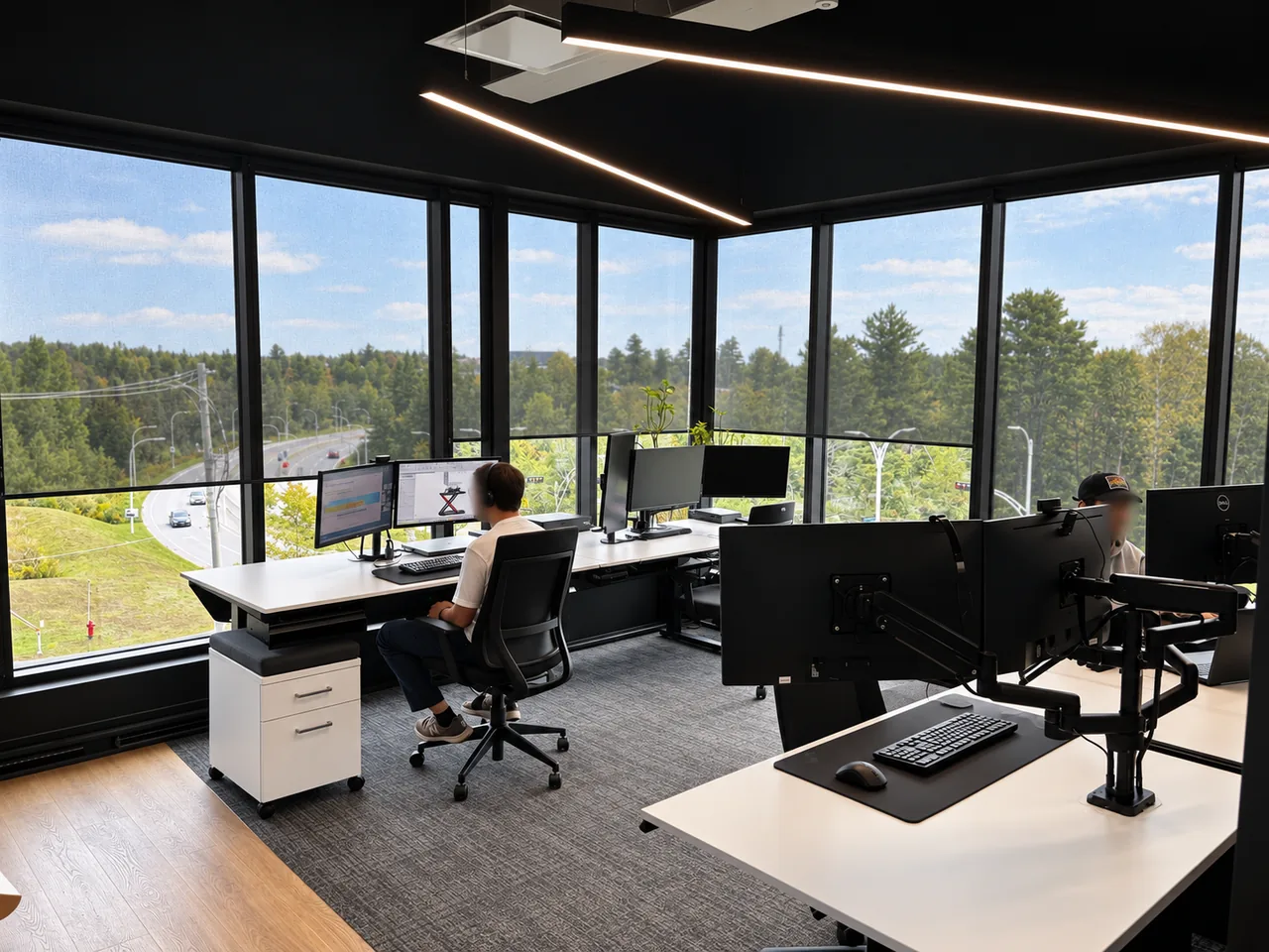 Team members working in the bright INOGEC offices