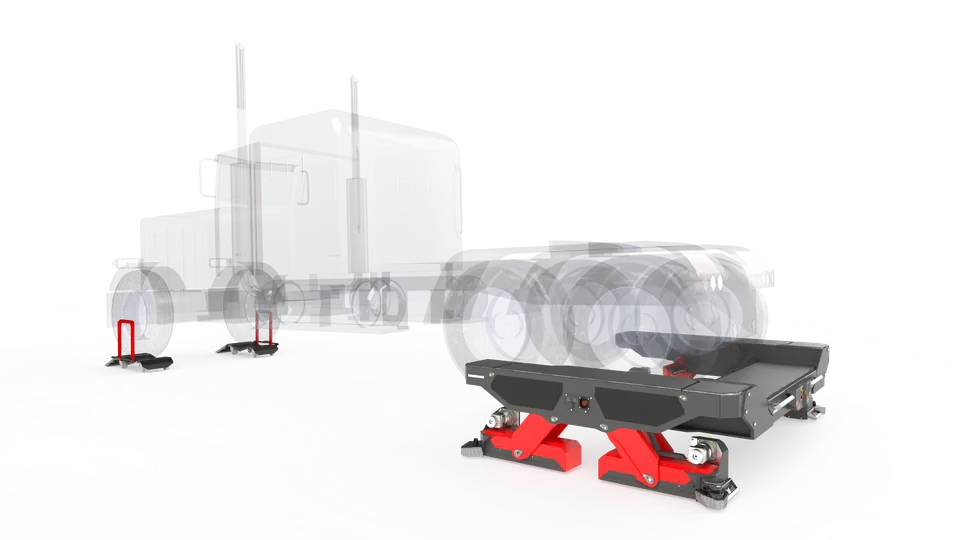 RTM-001 AGV platform beneath a truck on dollies